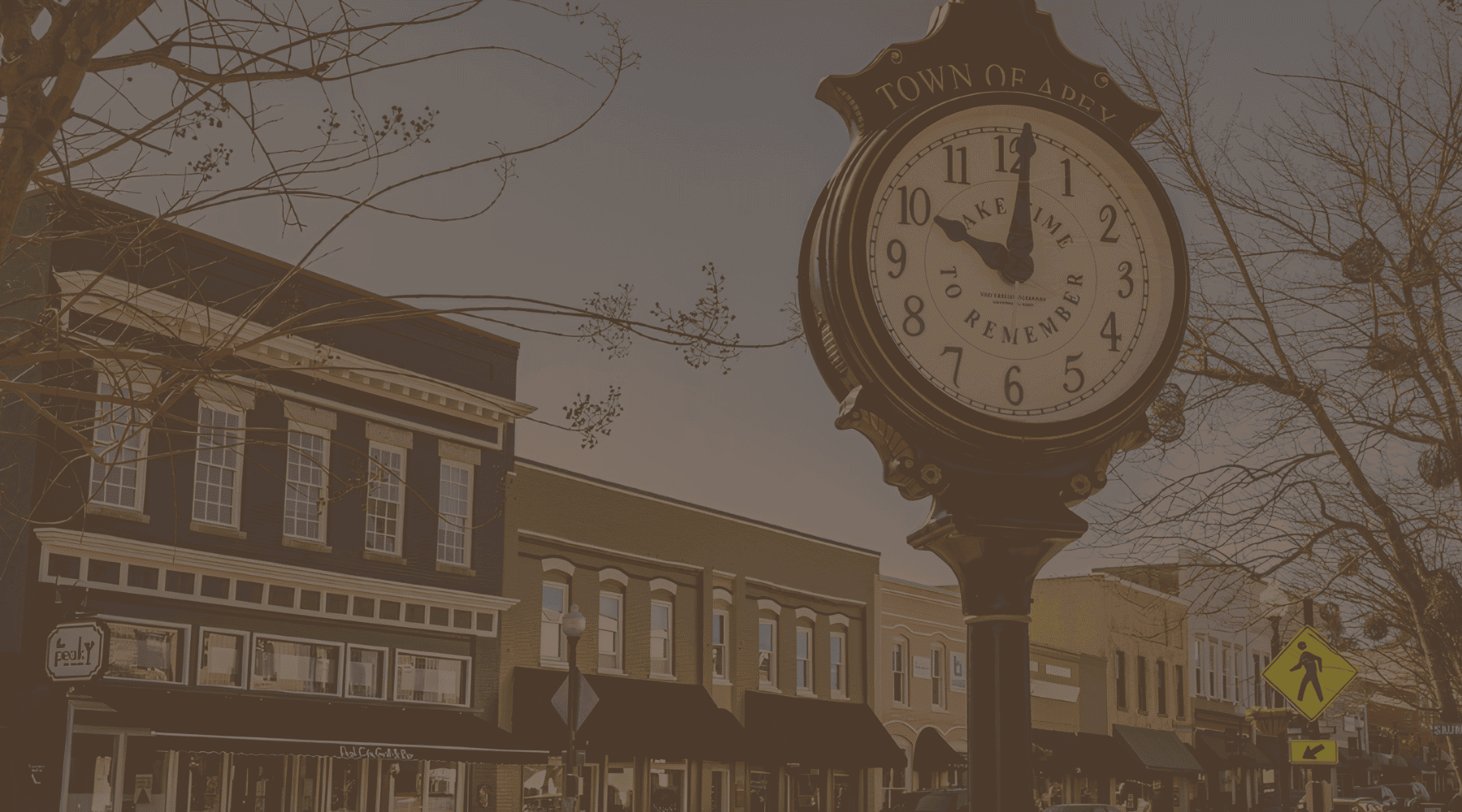 a clock in a town area